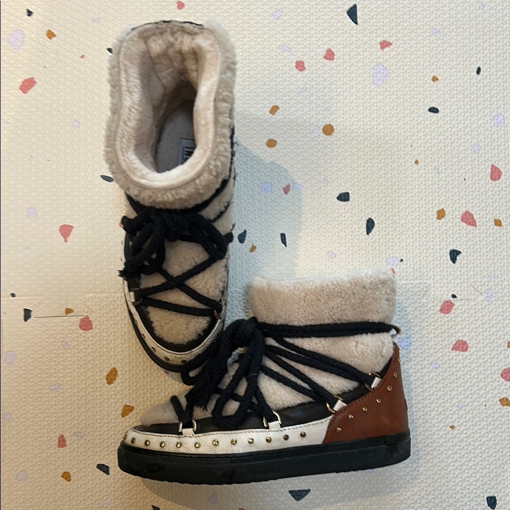 Cozy Black and Cream women’s Inuikii boots